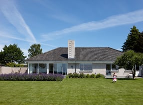 If the facade and window frames are brightly colored, the house will seem light